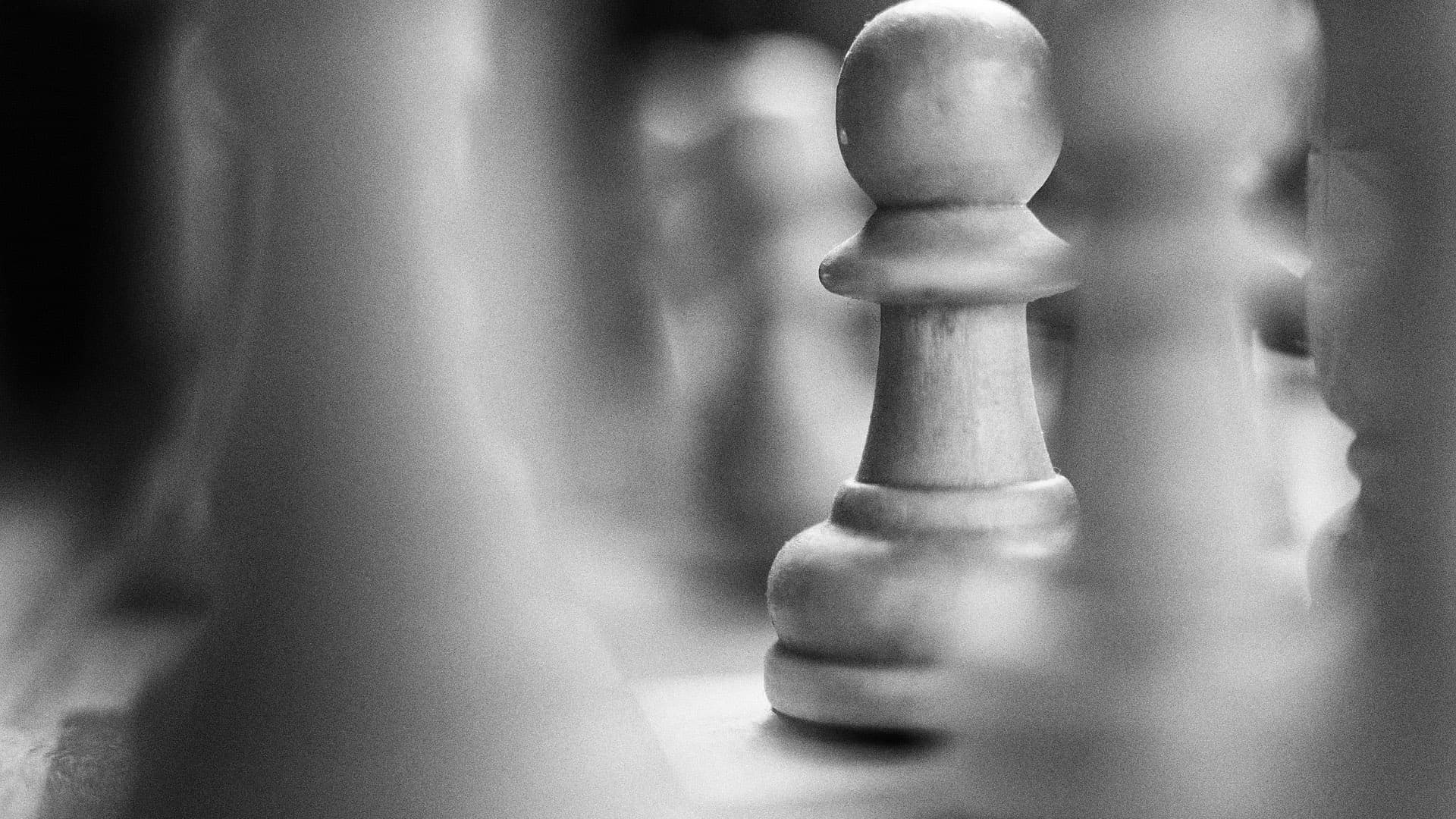 Chess pieces representing strategic tradeoffs